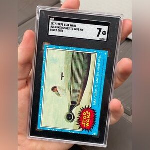 1977 Star Wars #25 Luke Rushes To Save His Loved Ones SGC 7 NOT PSA